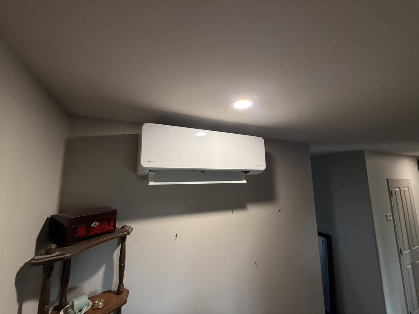 Newly installed wall-mounted heat pump indoor unit