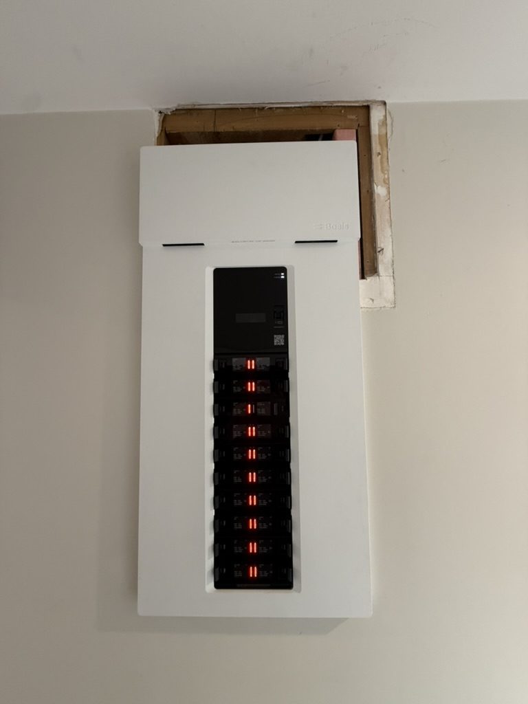 New modern switchboard installed in place of the old board