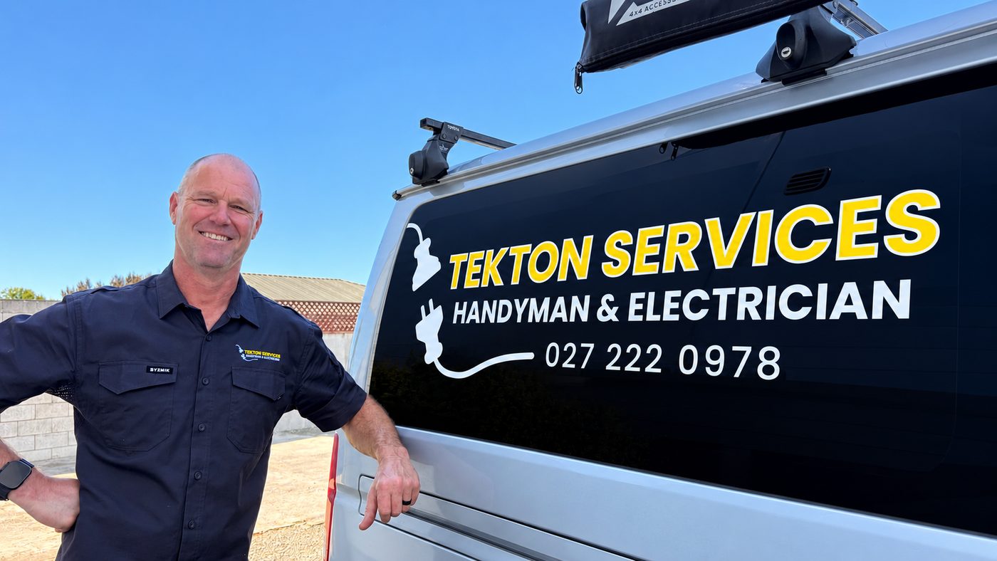Richard from Tekton Services standing beside the Tekton Services van
